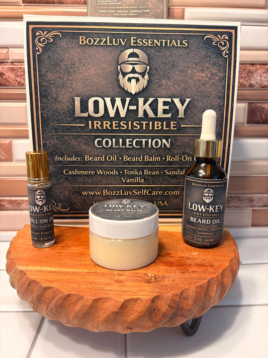 Men’s beard grooming bundle with beard oil, balm, and fragrance oil on wooden display