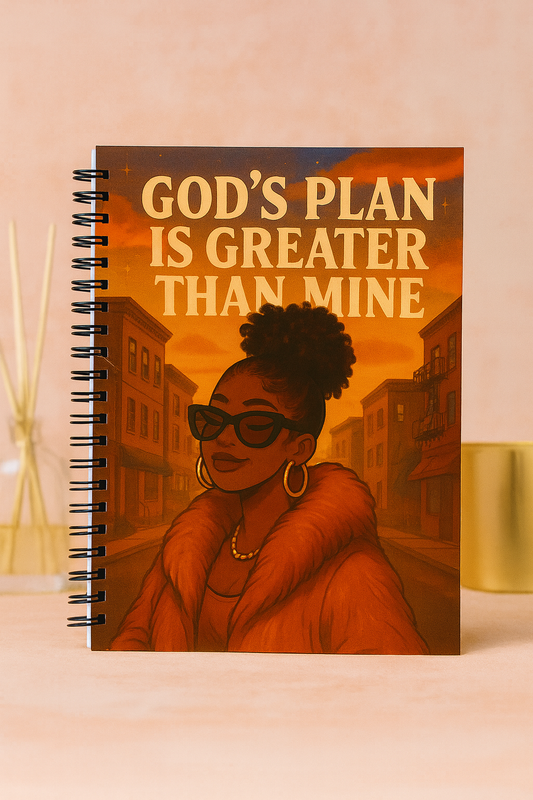 Cover of handmade faith-based spiral journal with text ‘God’s Plan Is Greater Than Mine’ on a warm patterned background.