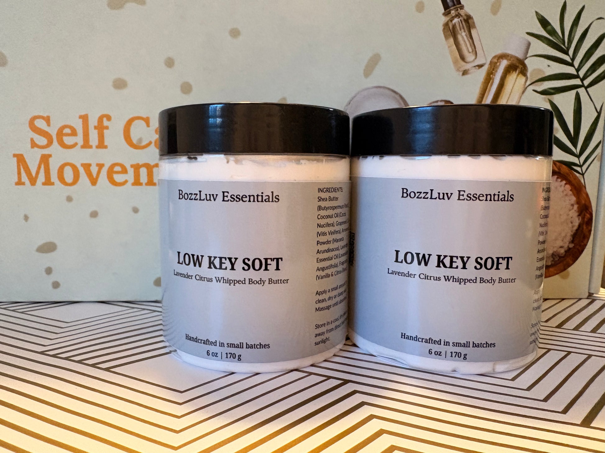 Pair of Low Key Soft lavender citrus whipped body butter jars by BozzLuv Essentials showcasing clean, modern packaging