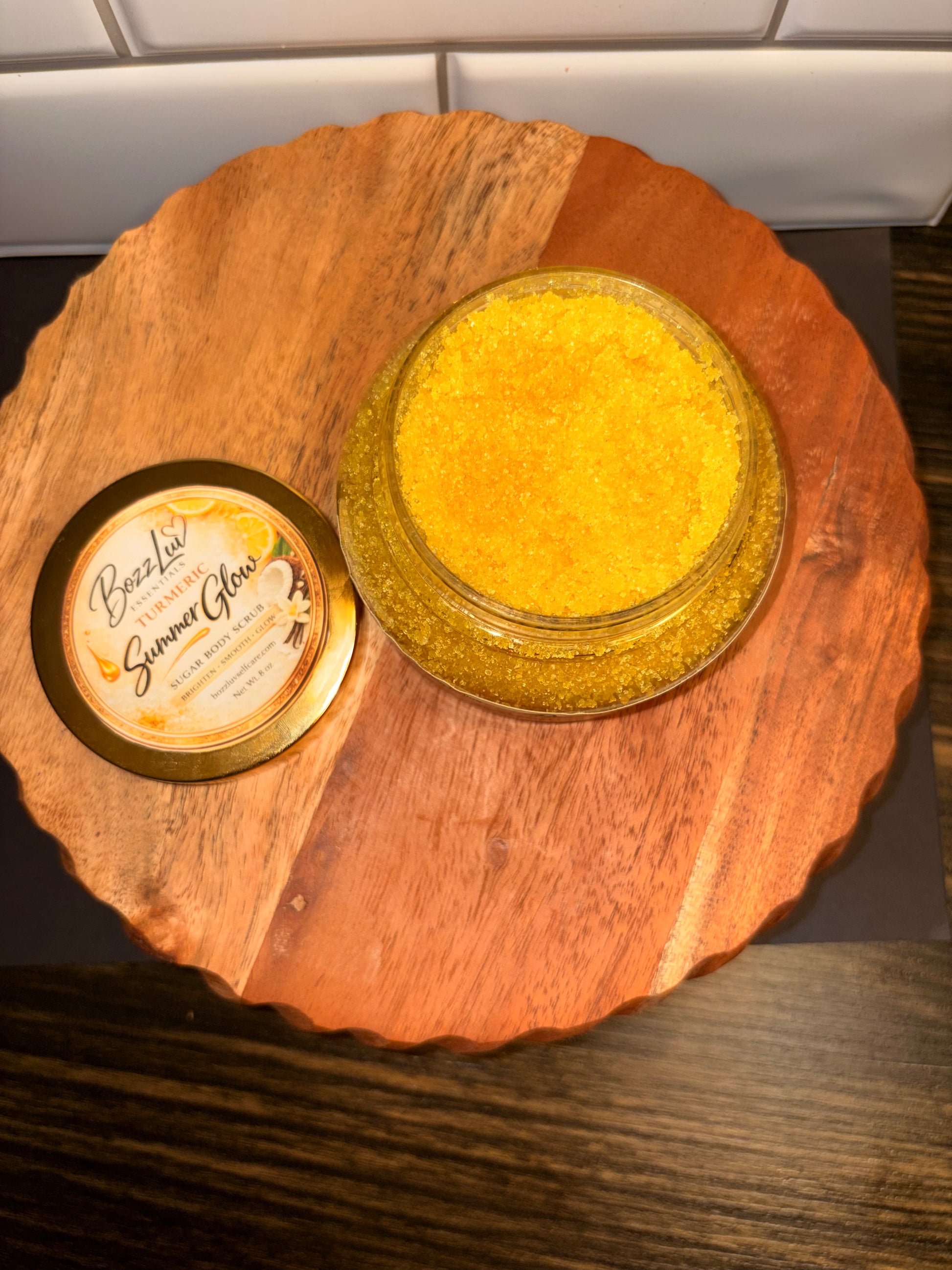 turmeric sugar body scrub for glowing skin with lemon coconut vanilla fragrance