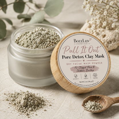Pull It Out Pore Detox Clay Mask by BozzLuv Essentials in frosted glass jar with bamboo lid and detox clay powder displayed beside product.