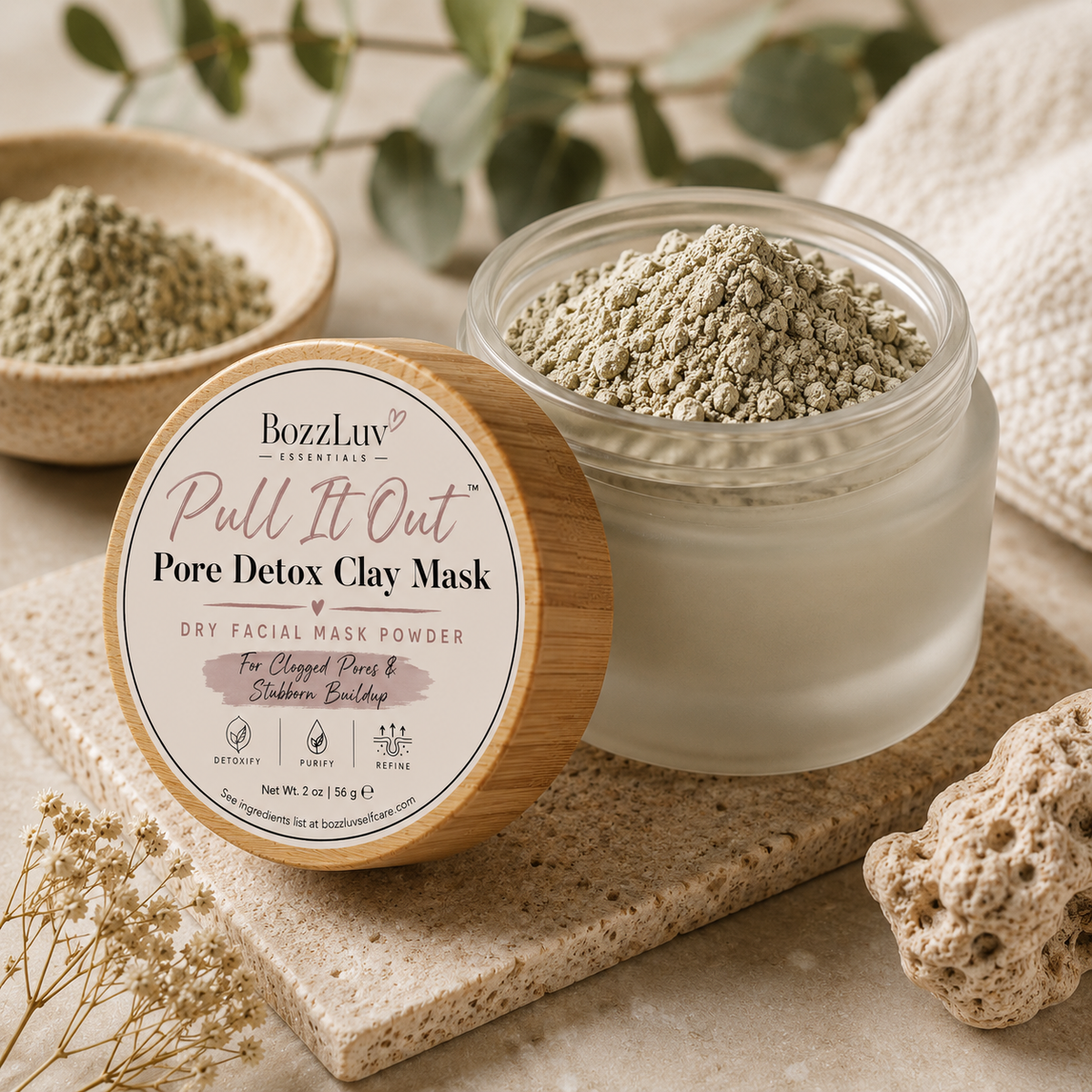 Spa-inspired product photo of Pull It Out Pore Detox Clay Mask in frosted glass skincare jar with bamboo lid and natural clay ingredients.